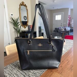 Coach Black Leather Tote with Exterior Zip Pocket and Gold Hardware